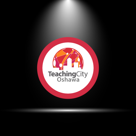 TeachingCity logo under spotlight