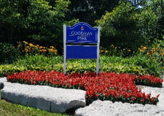 Annual floral display with Goodman Park sign