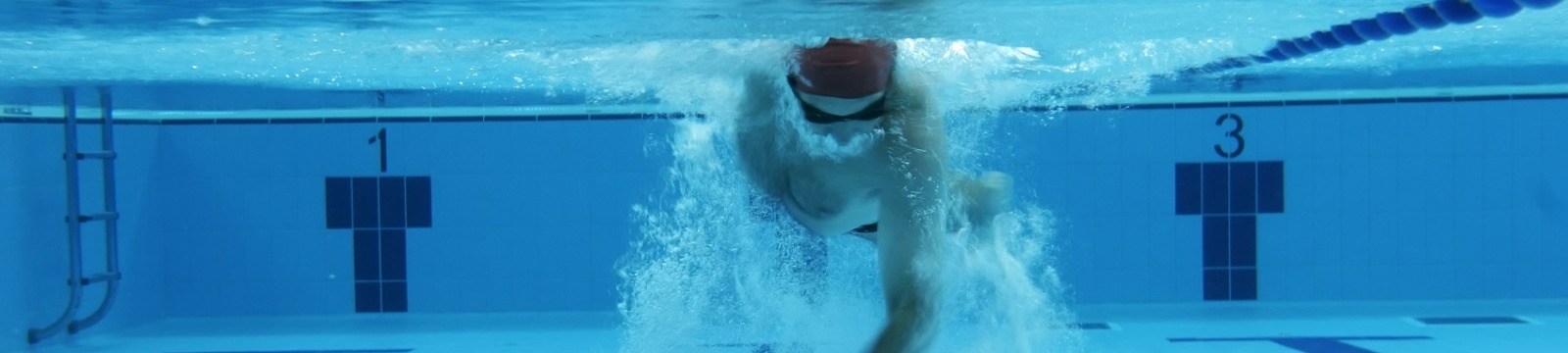 A person swimming underwater