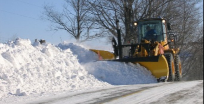 A loader clearing snow