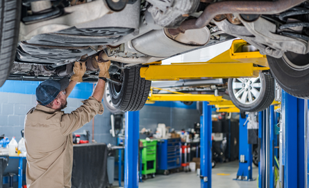 Mechanic working on car