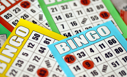 colourful bingo cards and marker chips