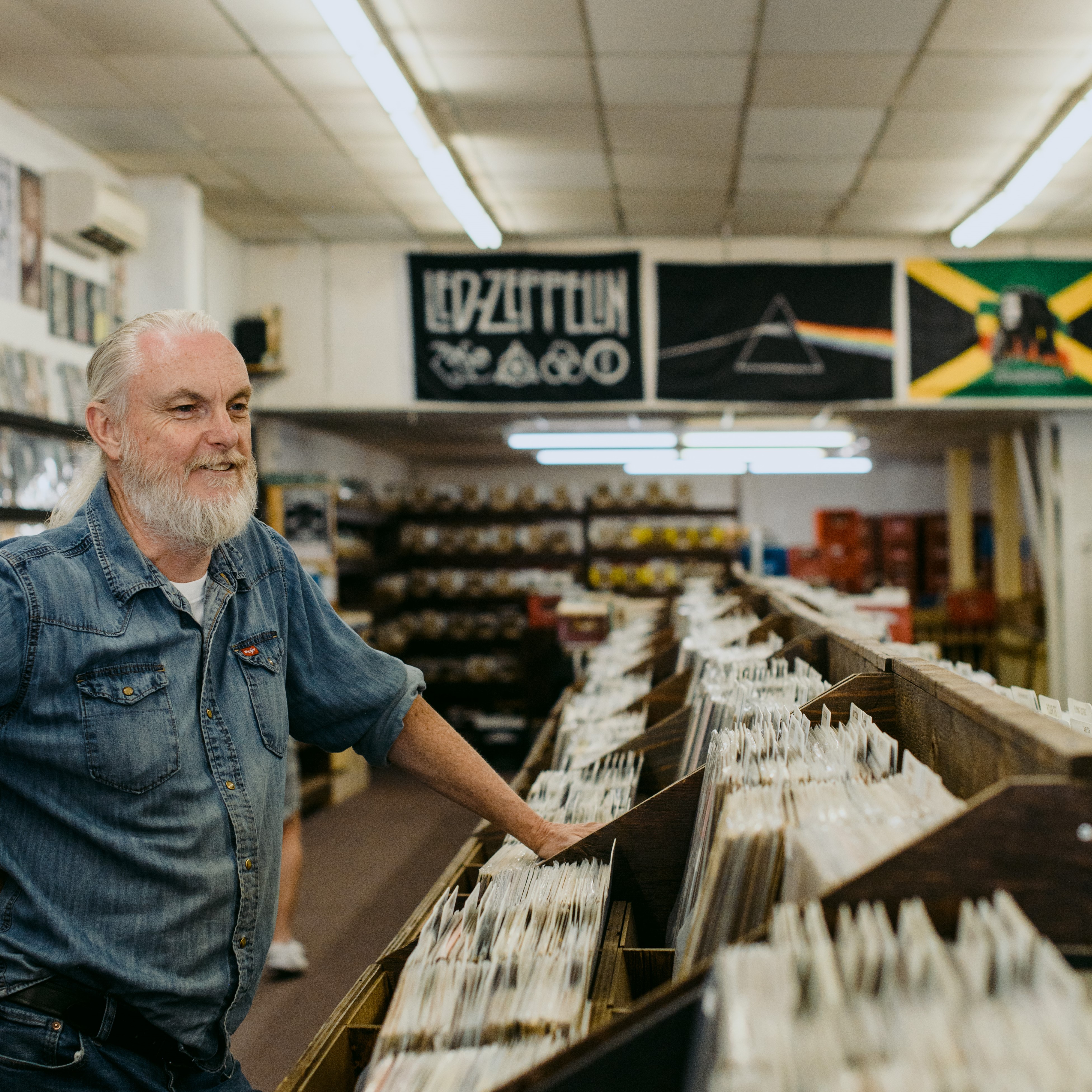Man in record store