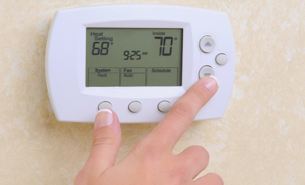hand adjusting thermostat