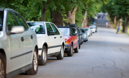 cars parked on side of street