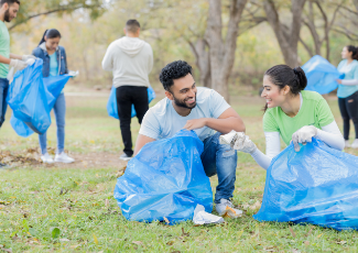 People cleaning up green space