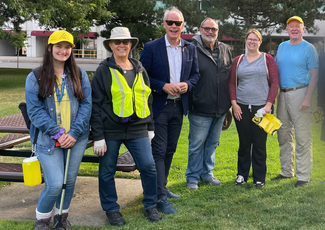 Mayor and people outdoors after a clean up event