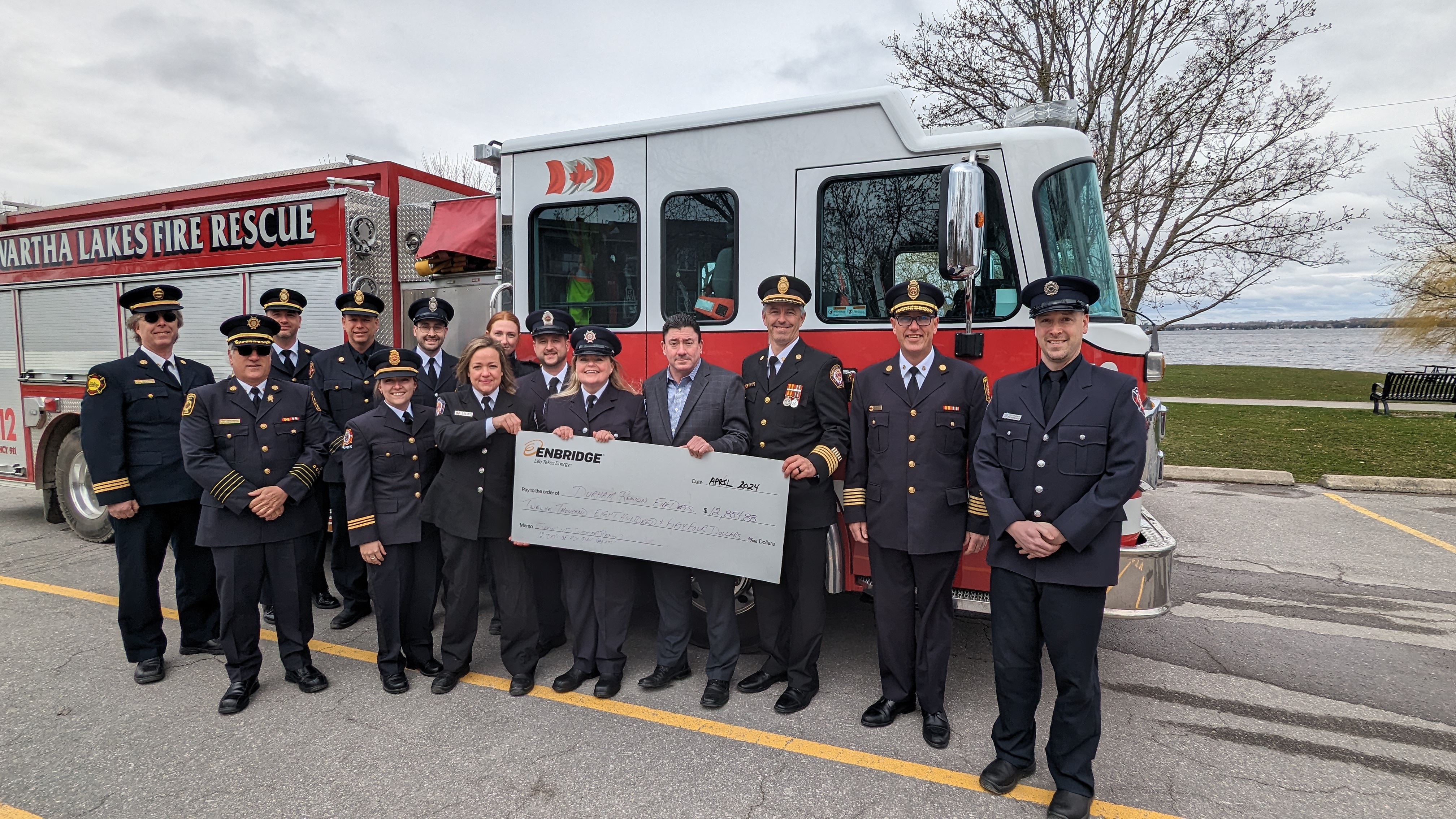 Oshawa Fire Services is presented with cheque from Enbridge Gas
