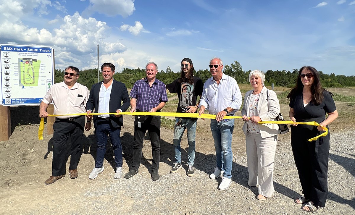 Members of Oshawa City Councilare joined by Steven Lind, a member of the local BMX community for the official ribbon-cutting of Oshawa’s first BMX Bike Park.
