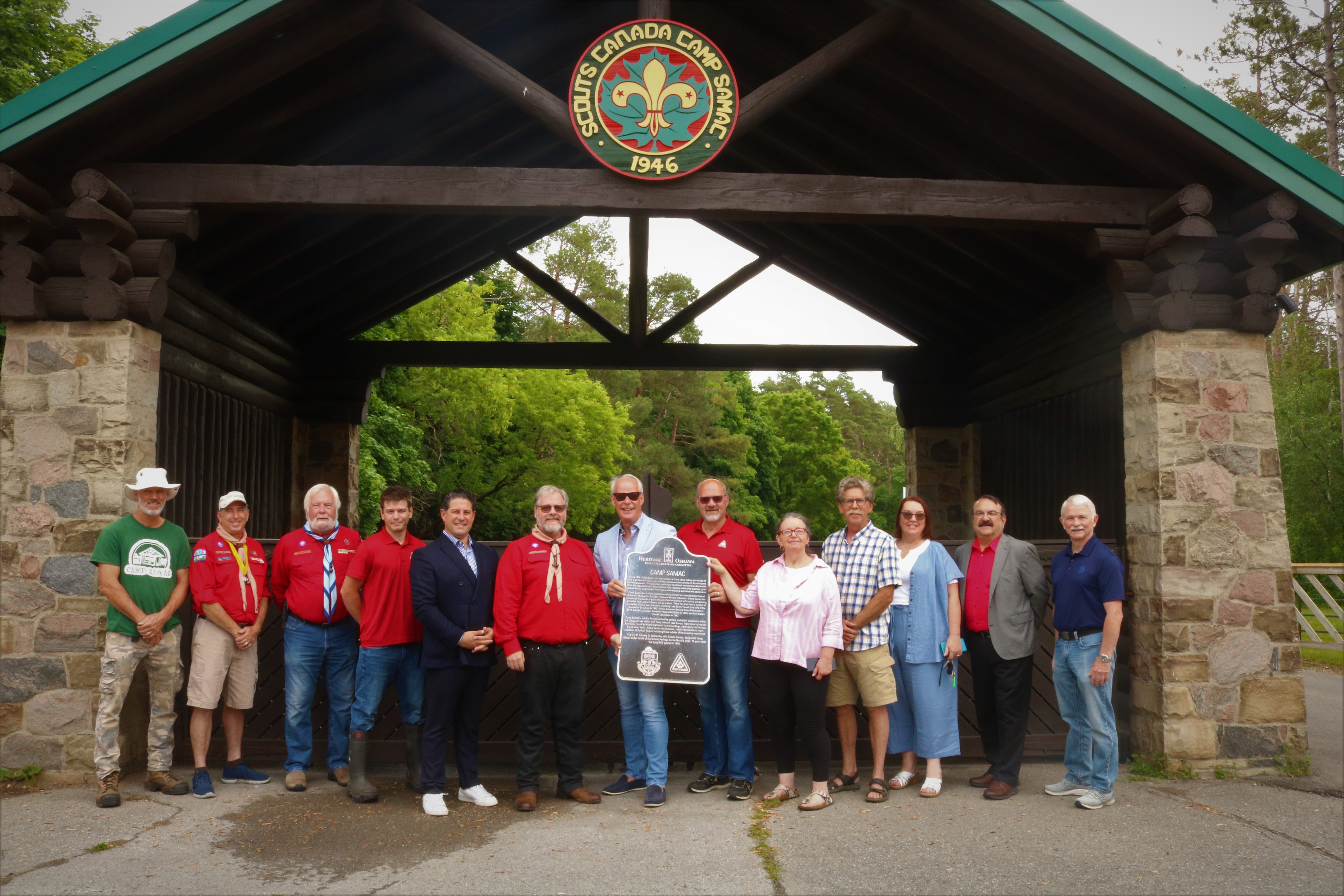 Representatives from Scouts Canada joined members of City Council and Heritage Oshawa to celebrate a heritage plaque that illustrates the designation of Camp Samac as a property of cultural heritage value or interest under the Ontario Heritage Act.