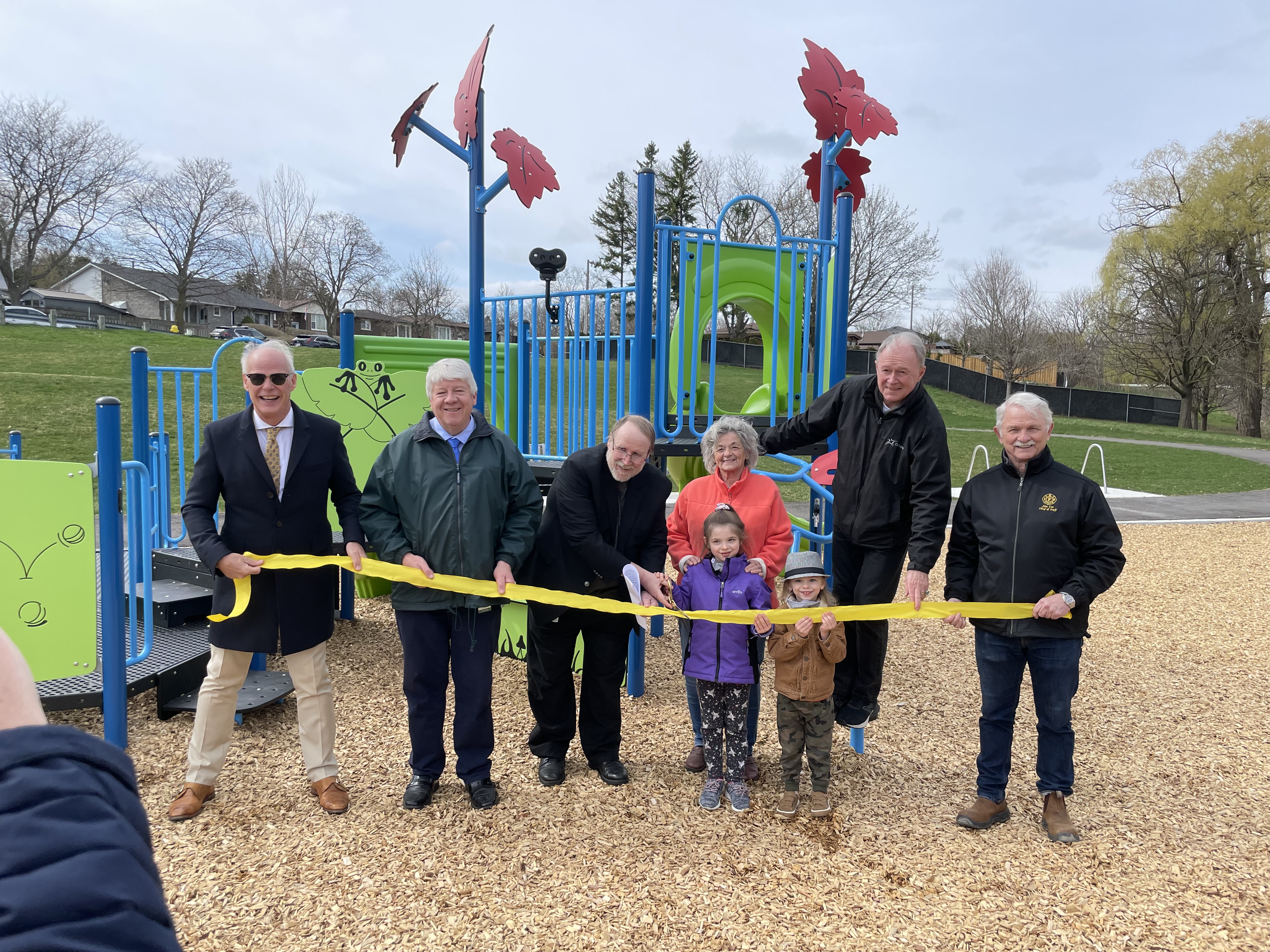 Neighbourhood residents join Oshawa City Council for the official reopening of Florell Park. 