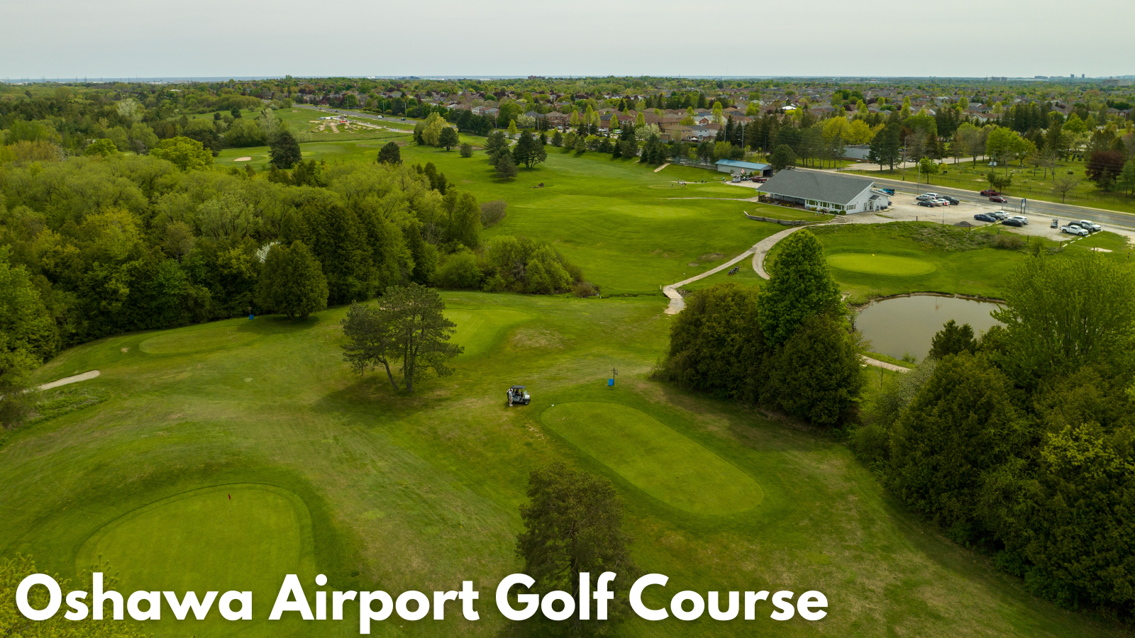 a golf course with text in white that reads Oshawa Airport Golf Course below