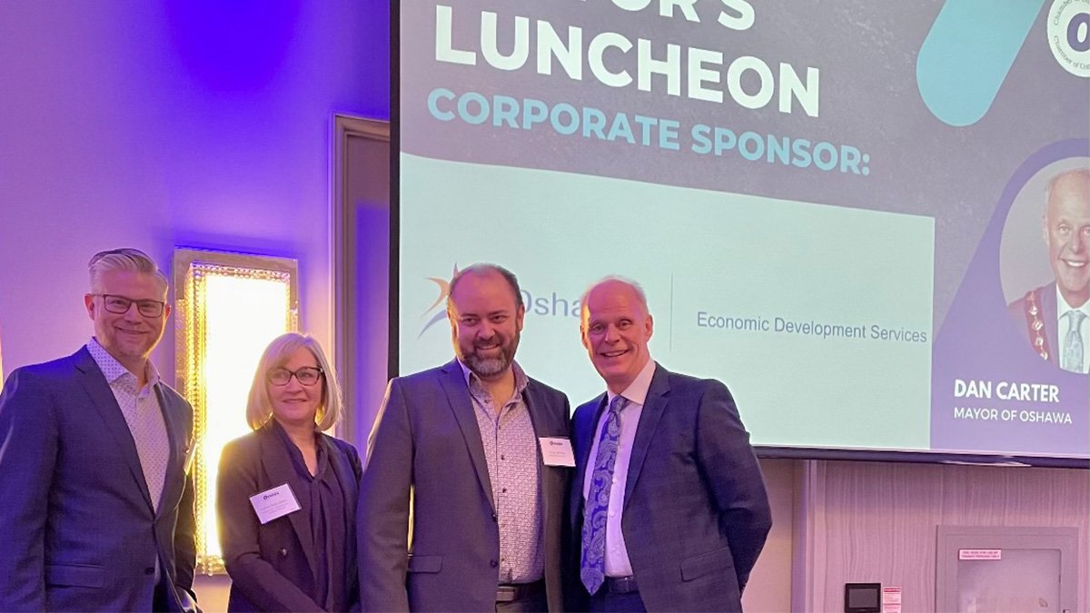 Mayor Dan Carter with Greater Oshawa Chamber of Commerce executive members (l to r) Steve Conaby, Vice-President; Carrie-Anne Atkins, Second Vice-President and Peter Bocking, President.
