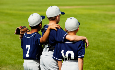 Three young baseball players