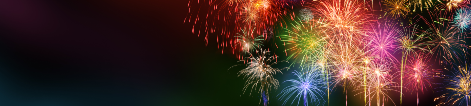 Black background far right of screen is up close colourful fireworks bursts.