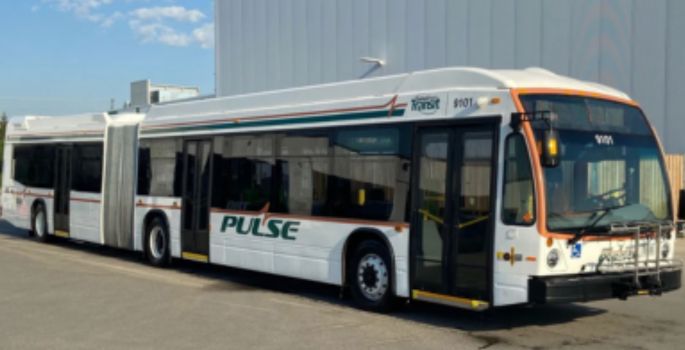 Side image of a Durham Region Transit Shuttle Bus