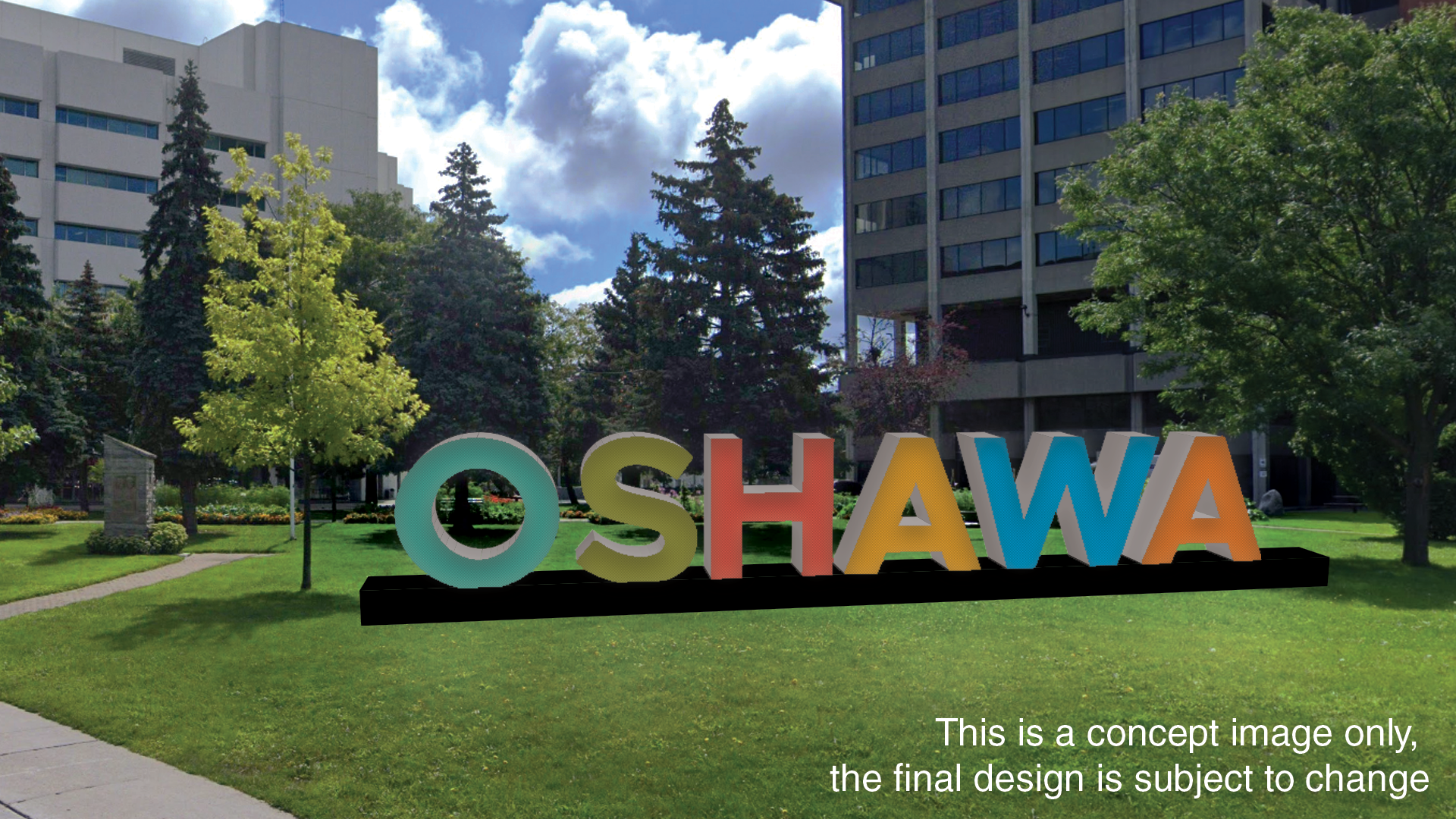 the word oshawa with each letter a different colour on the lawn in front of a large building in a park like setting