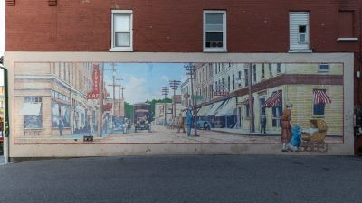 The mural depicts a streetscape of downtown Oshawa from 1935.