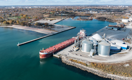 Arial photo of Oshawa port, lakefront view, pier and large boat.