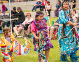 Indigenous Women, Teen and young child dance in cultural regalia clothing