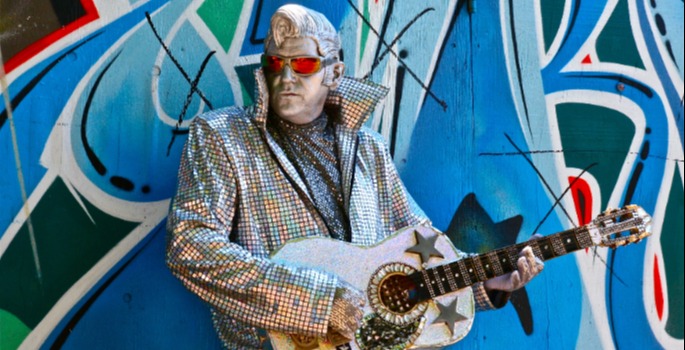 silver man with guitar