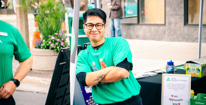 Community event displayer at a display table