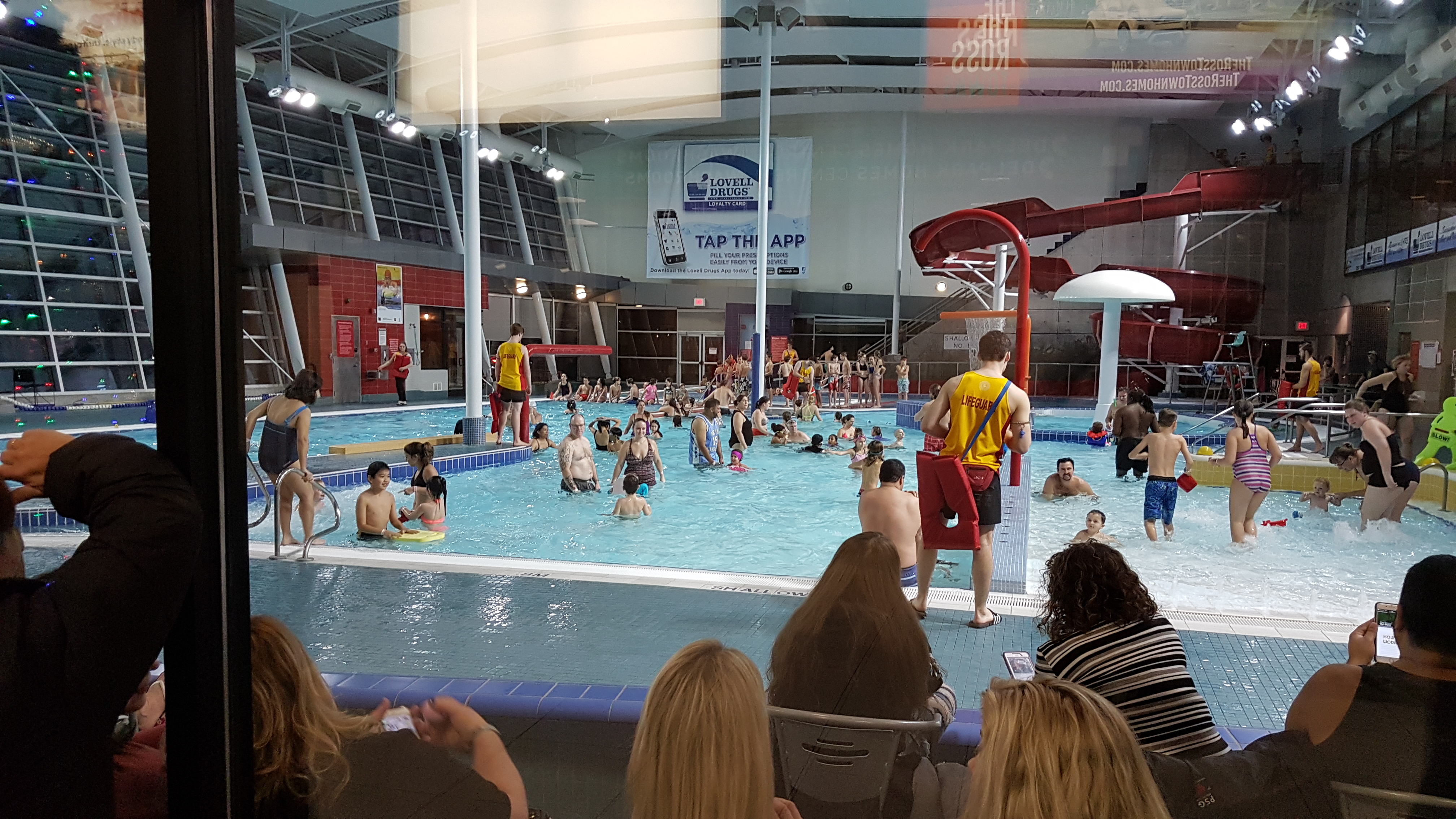 People swimming in an indoor pool