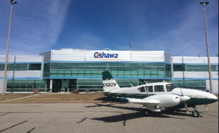 Airplane in front of hanger