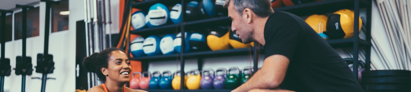 Person working out with personal trainer