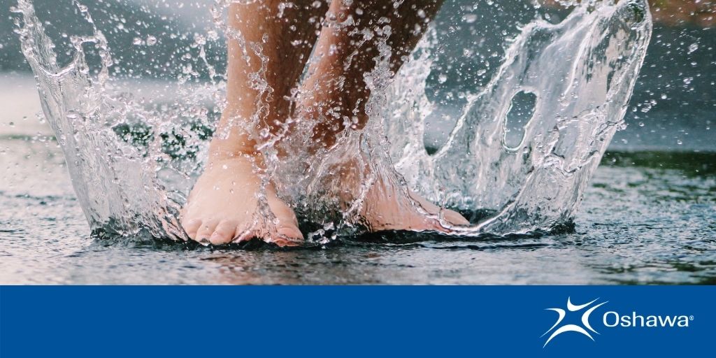feet splashing in water