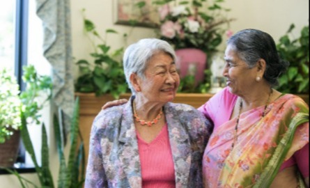 Two older ladies smiling