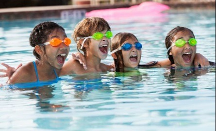 Four kids in a pool