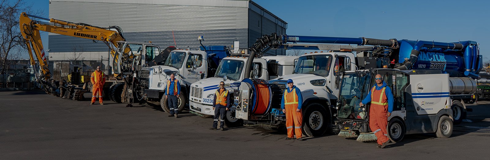Public Works at Work - City staff standing with equipment