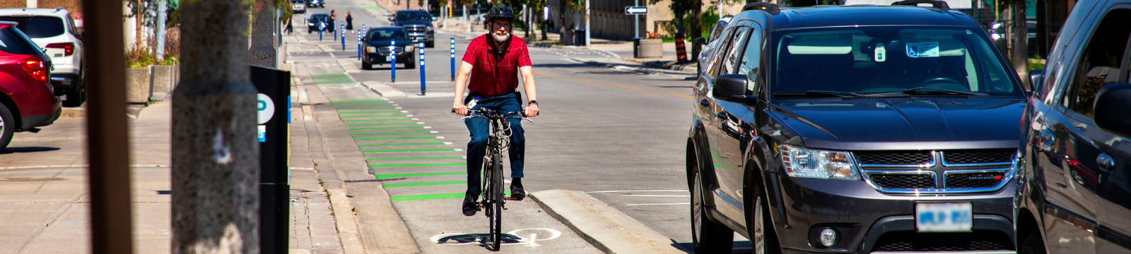 Cyclist on a downtown Oshawa street