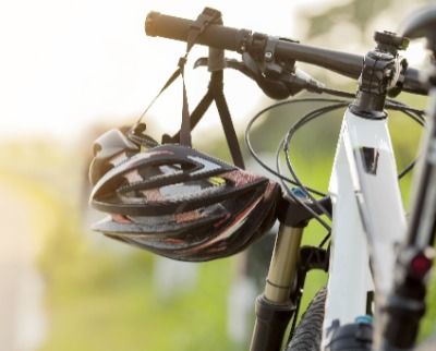 Mountain bike with bike helmet hanging from handlebars