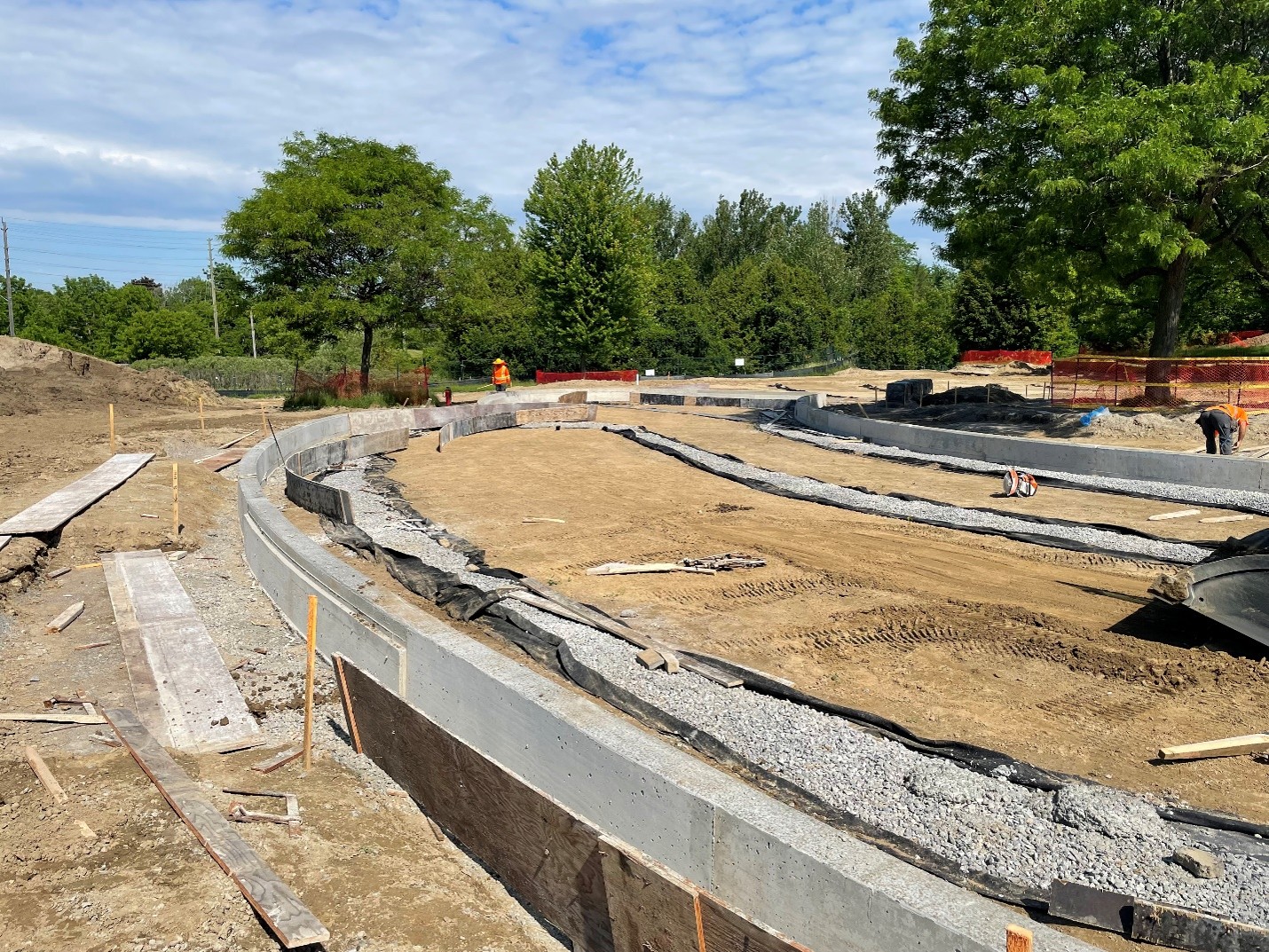 Installation of concrete curbs for swing bay