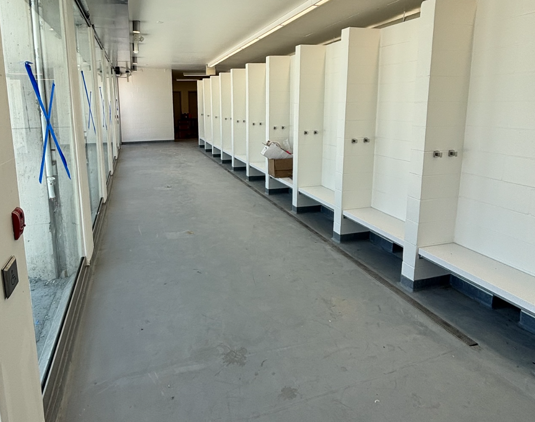 View of the changerooms inside Rotary facility. Includes outdoor showers on pool deck.