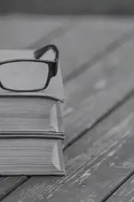 reading glasses on books