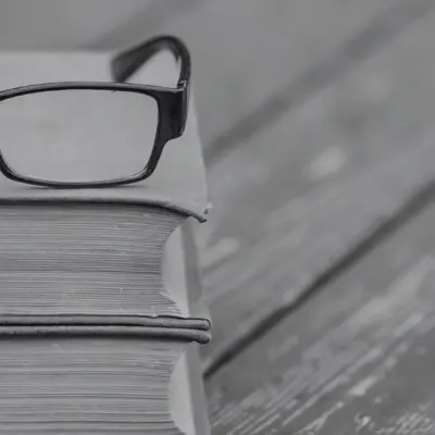 reading glasses on books