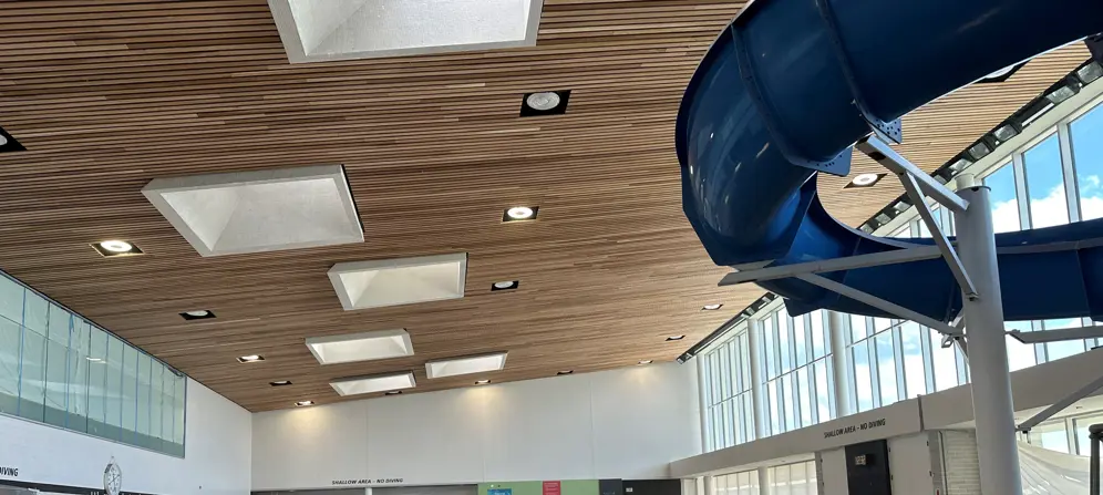Architectural wood slat ceiling installation completed – East view (June 2026) 