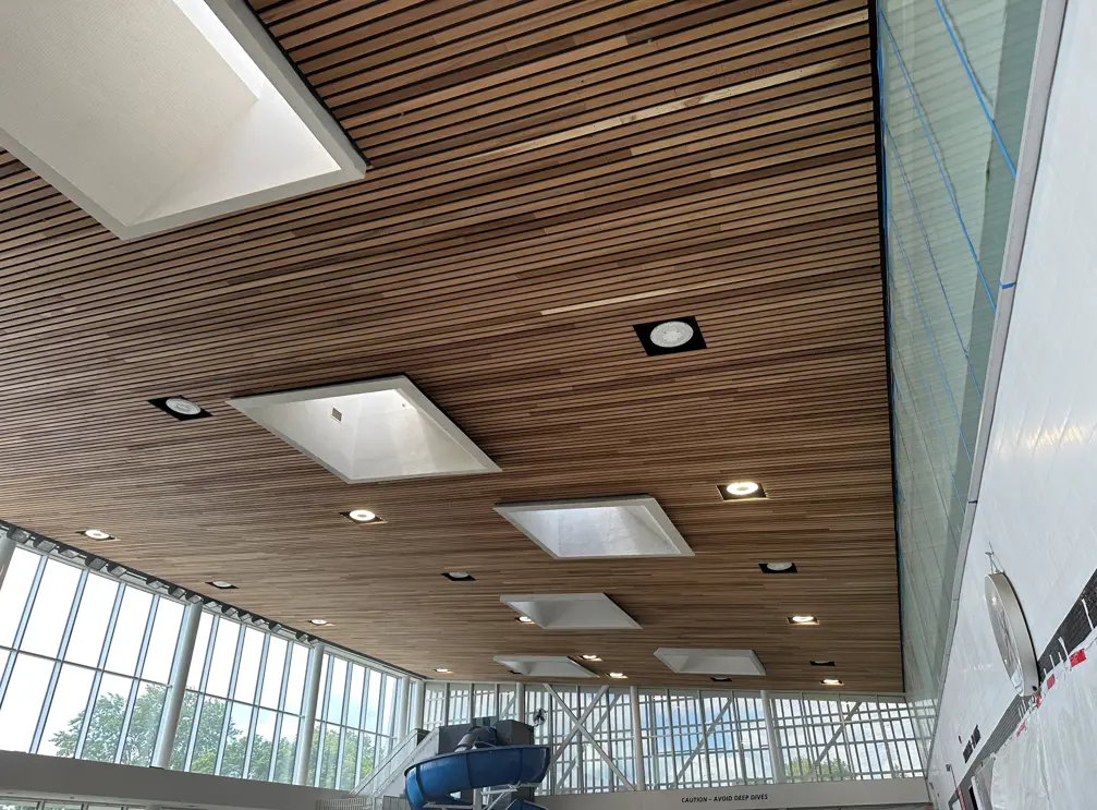 Architectural wood slat ceiling installation completed – West view (June 2026) 