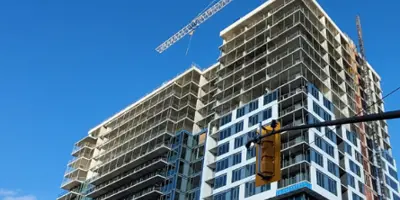 building be constructed with construction crane on top