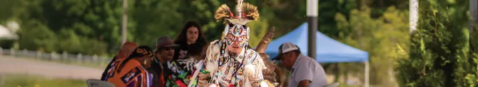person preforming an Indigenous dance