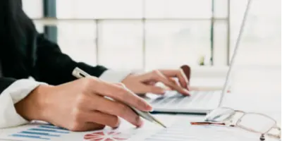 Person at a computer making a payment