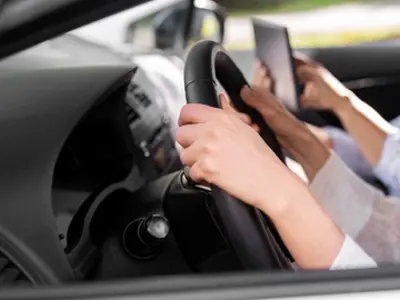Hands on steering wheel