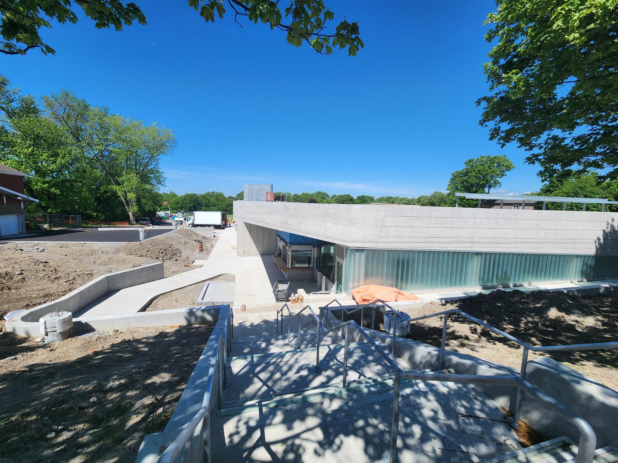 View of stairs to front entrance from Centre Street. Looking west towards Oshawa Creek.