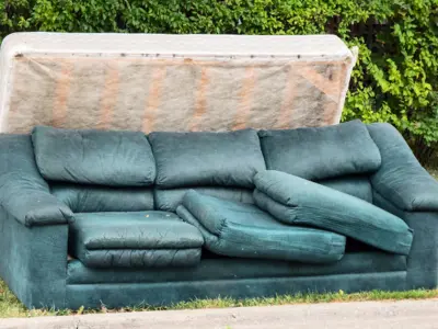 Mattress and Couch at curb