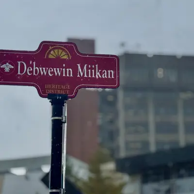 Debwewin Miikan street sign