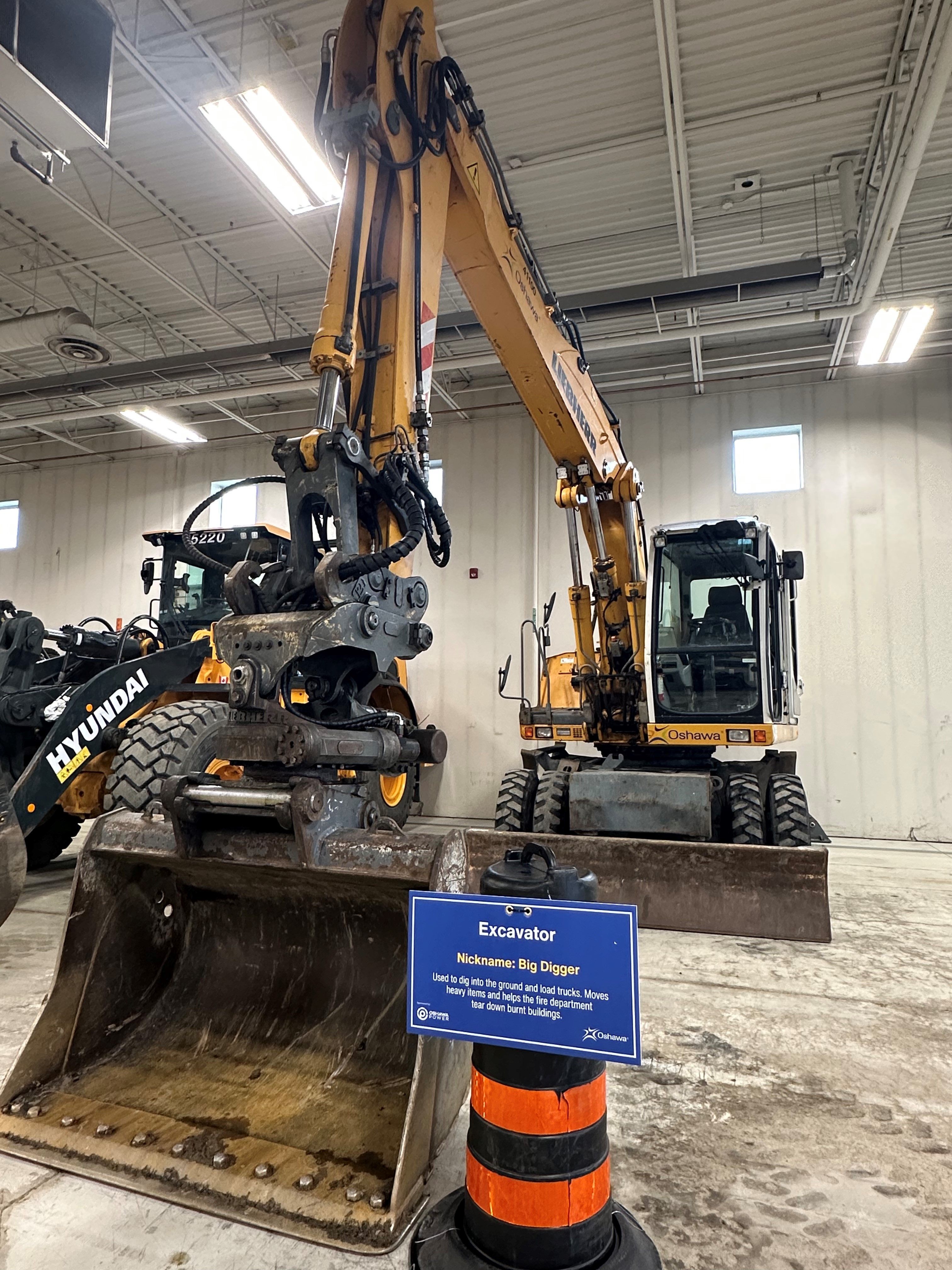 excavator with display sign