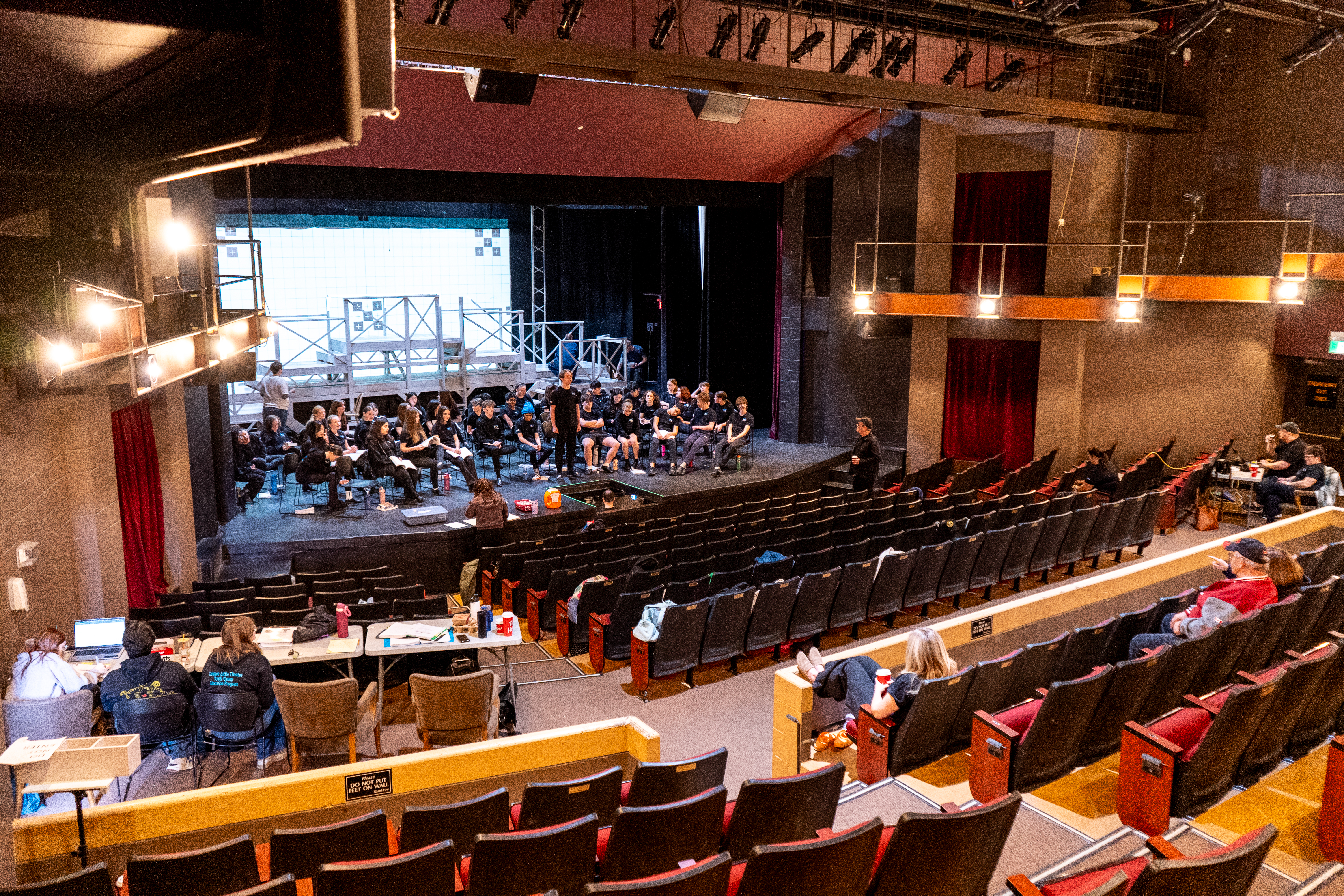 wide shot of theatre with performers on stage